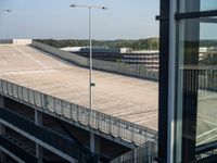 an outside parking lot is set off from the air plane area at an airport for boarding passengers