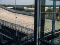 an outside parking lot is set off from the air plane area at an airport for boarding passengers