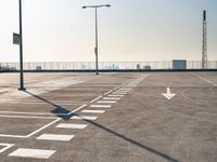 the empty parking lot is ready to be used as an event space for people to gather