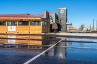 a store building sits empty and needs to be filled with water from the street side