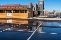 a store building sits empty and needs to be filled with water from the street side