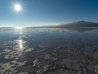 Clear Sky Landscape: Mountains and Salt Lake Views