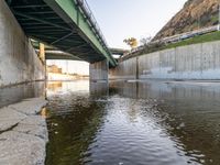 Clear sky over Los Angeles River bridge at dawn