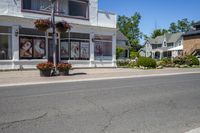 Clear Sky Suburban Road with Houses during the Day
