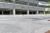 empty parking garage with large open spaces on one side and a parking spot next to it