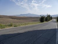 Clear Sky Over Tuscany, Italy: Contrails Dotting the Horizon