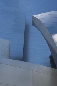 a close up of a white building with many different angles of architecture around it at an angle to the sky