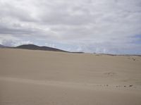 Clouds Over Desert Landscape