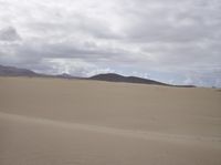 Clouds Over Desert Landscape