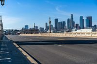 a view of the city skyline from across the street from the bikeway bridge in downtown la jolla