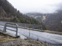 Cloudy Road in a Mountain Pass in the Alps