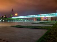 A View of a Cloudy Sky and Illuminated Buildings in the City