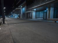 Coastal City at Night: Lights and Ocean View