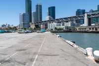 Coastal City: A Pier Overlooking the Ocean with Clear Sky