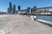 Coastal City: A Pier Overlooking the Ocean with Clear Sky