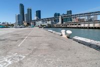 Coastal City: A Pier Overlooking the Ocean with Clear Sky