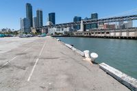 Coastal City: A Pier Overlooking the Ocean with Clear Sky