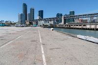 Coastal City: A Pier Overlooking the Ocean with Clear Sky