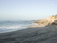 Coastal Day at the Beach: Clear Sky and Open Space