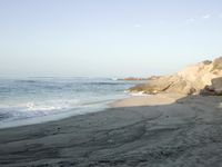 Coastal Day at the Beach: Clear Sky and Open Space