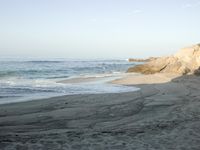 Coastal Day at the Beach: Clear Sky and Open Space