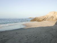 Coastal Day at the Beach: Clear Sky and Open Space