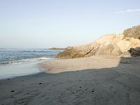 Coastal Day at the Beach: Clear Sky and Open Space