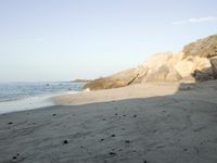 Coastal Day at the Beach: Clear Sky and Open Space