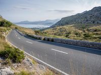 Coastal Highway in Spain: Clear Sky and Ocean View