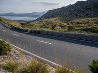 Coastal Highway in Spain: Clear Sky and Ocean View