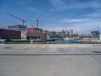 Coastal Jetty in Barcelona's Harbor: Enjoying the Clear Sky