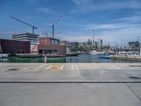 Coastal Jetty in Barcelona's Harbor: Enjoying the Clear Sky