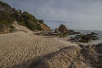 Coastal Landscape at Dawn: Majestic Mountains and Serene Shores