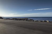 Coastal Landscape: Clear Sky and Calm Ocean in New Zealand