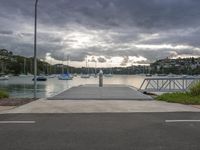 the boardwalk at the dock of a boat launch is empty and ready to be put in for a day