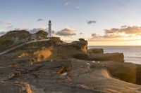 Coastal Landscape at Dawn with Sun and Ocean