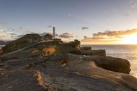 Coastal Landscape at Dawn with Sun and Ocean