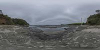 the view of an island and body of water from a point of view fisheye