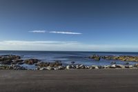 Coastal Landscape of New Zealand: Clear Sky and Azure Waters