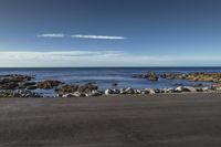 Coastal Landscape of New Zealand: Clear Sky and Azure Waters