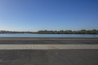 Coastal Landscape with Open Space, Road, and Trees