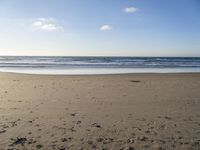 Coastal Landscape in Portugal: Golden Sand and Clear Azure Waters