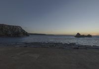 Coastal Landscape of Portugal: Sun Visible Over the Water