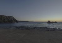 Coastal Landscape of Portugal: Sun Visible Over the Water