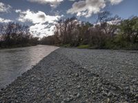 there is an image of the river with rocks in it that look very rough and rocky