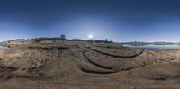 the 360 view lens shows how a small body of water can look like it has been washed down and is partially