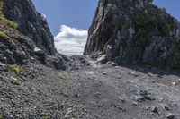 a rock climbing slope with a steep path near by, in the scottish highlands near ulna, scotland