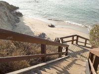 Coastal Property: Sand and Water with Clear Skies