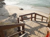 Coastal Property: Sand and Water with Clear Skies