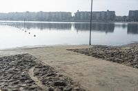 Coastal Reflections: Sand and Clear Skies